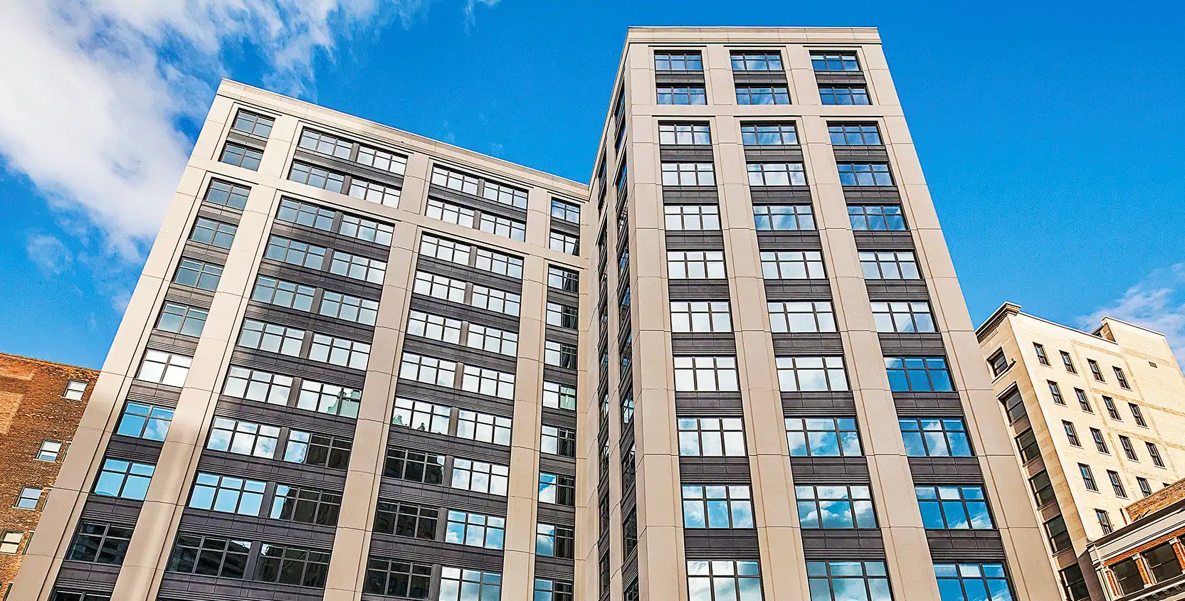 28 W Grand Lofts-Exterior-Facade-1665x845